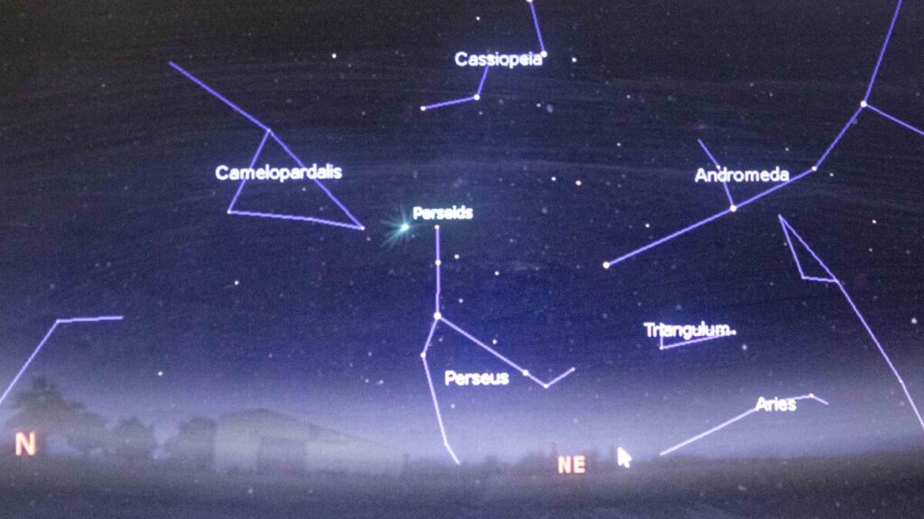 Starry night sky over Ifrane Astronomy Festival showing named constellations and stars like Sirius, Betelgeuse, and Vega